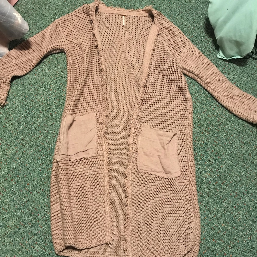 Long Free People pink cardigan with frayed sleeves